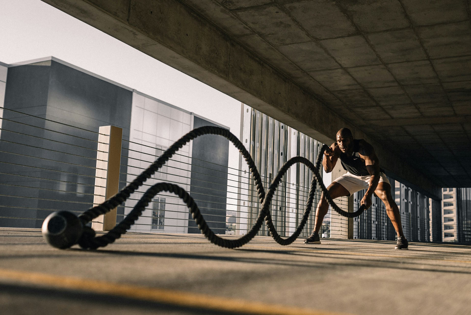 Battle ropes on a fitted gym floor